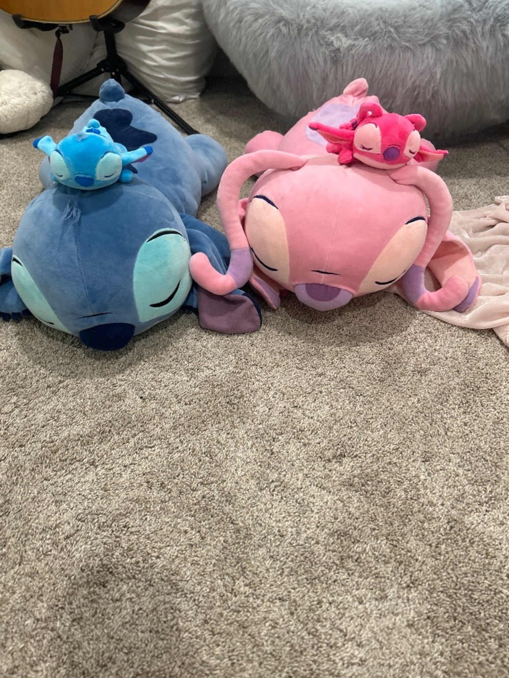 Disney stitch and angle plushies